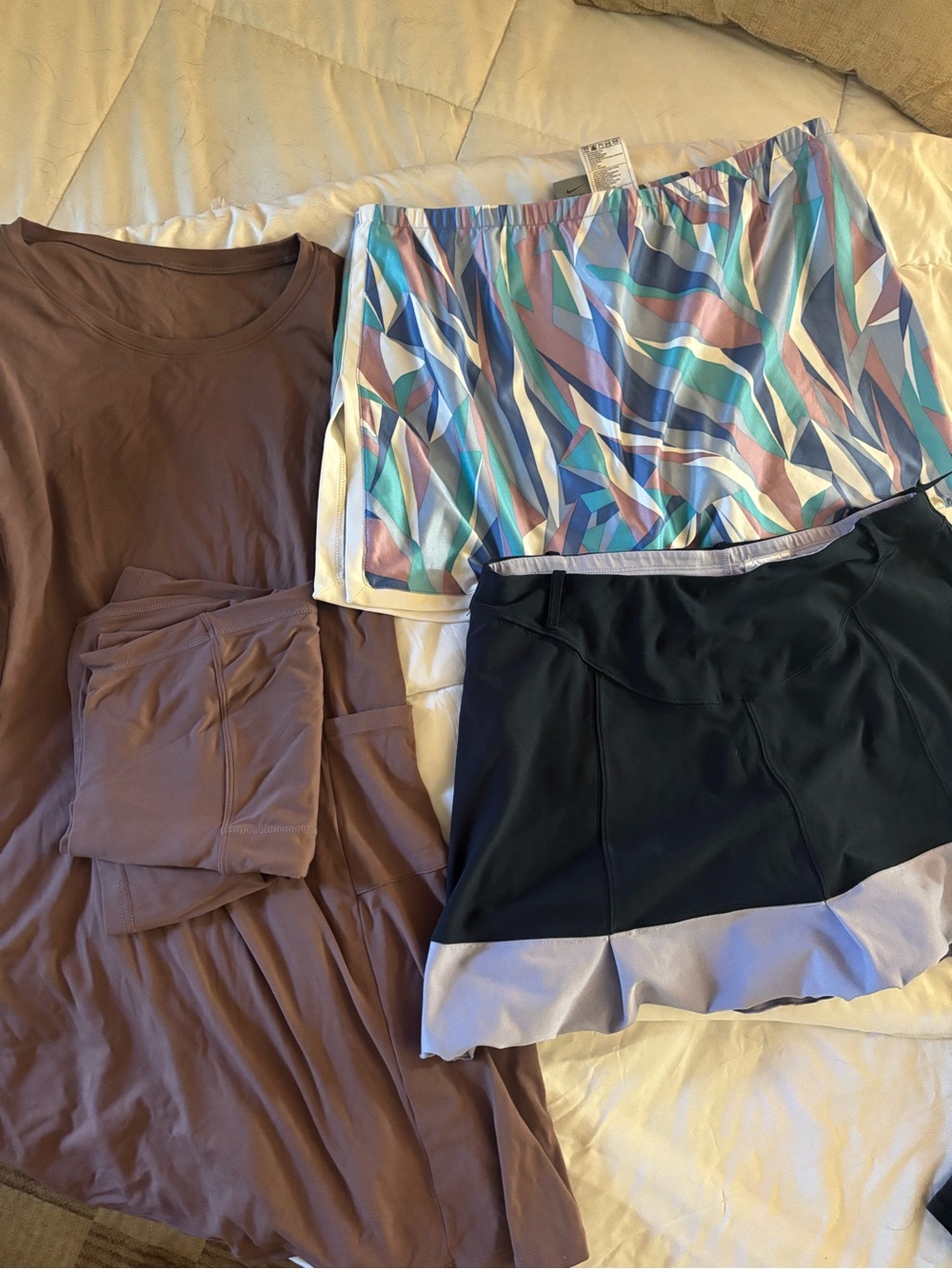 Tennis/ Pickleball bundle. 1 dress and two Nike skirts with built in shorts.
